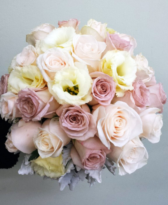 roses and lisianthus with dusty miller foliage