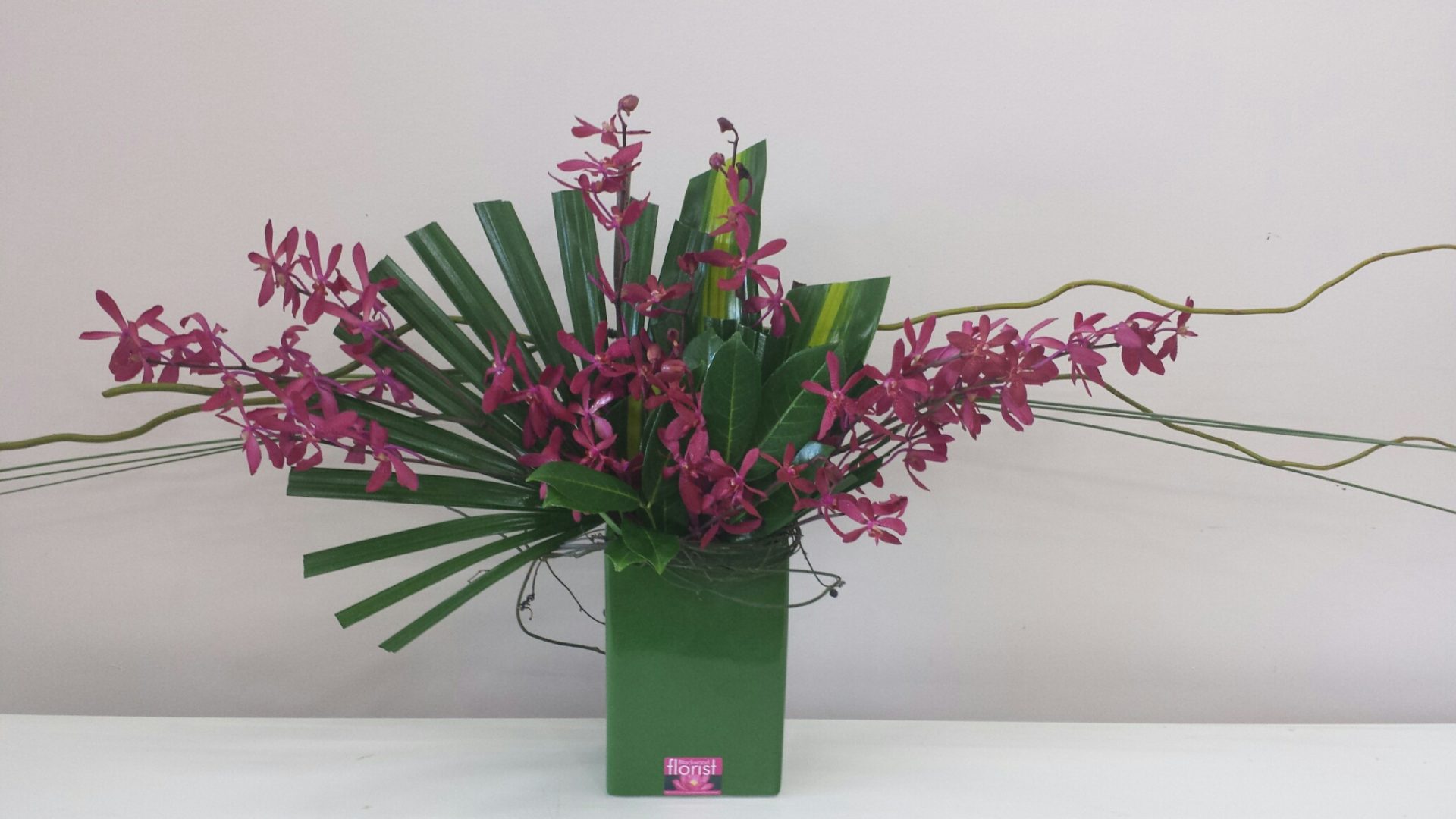 Oriental style orchid arrangement