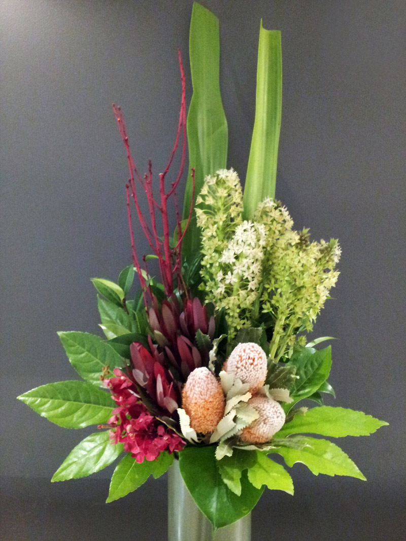 Artificial arrangement with Pineapple lilies, Leucadendron, Banksia and orchids