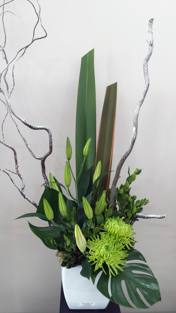 Corporate-Snow-Design with frosted branches and oriental lilies