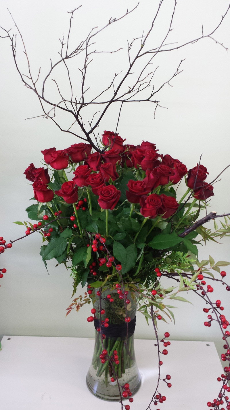 Event design with red roses and berries