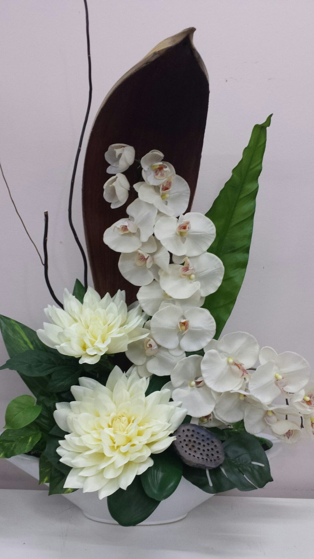 ceramic boat design with orchids and lotus pods